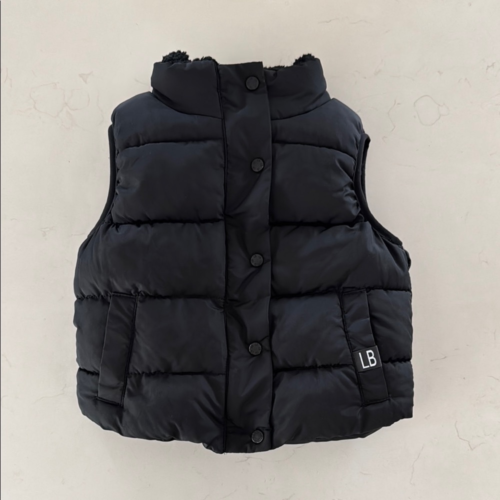 Little Bipsy Sherpa Lined Puffer Vest in Black Size 18-24M.